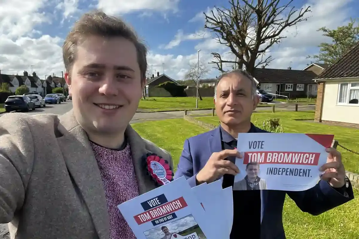 Cllr Tom Bromwich & Shahzaad Malik delivering flyers